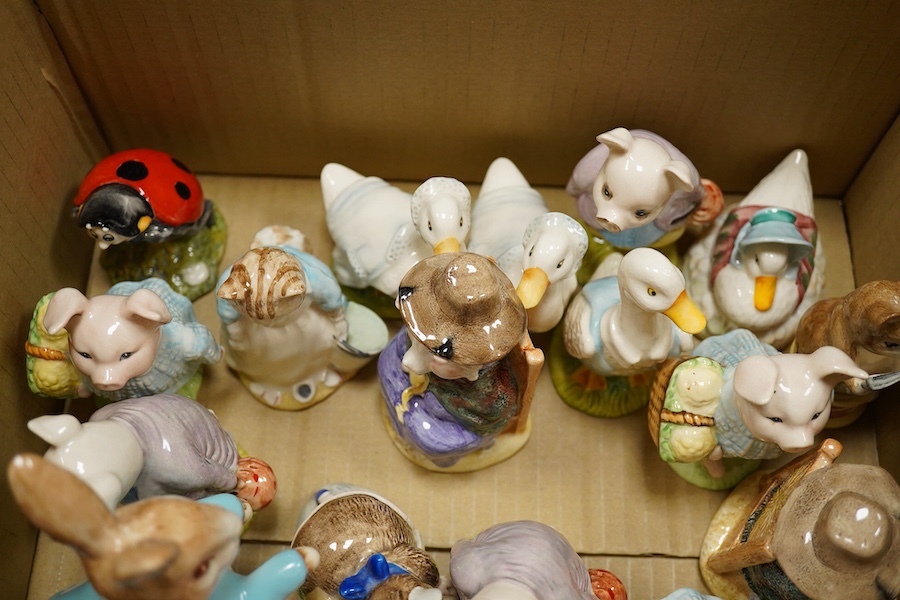 A collection of Royal Albert Beatrix Potter figures, tallest 17cm high
